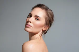 Woman with youthful skin after skin tightening treatment.