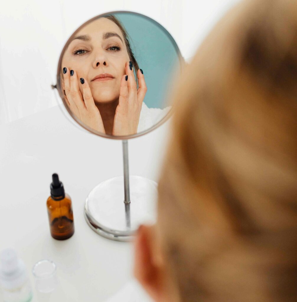 Woman Looking in Mirror 1